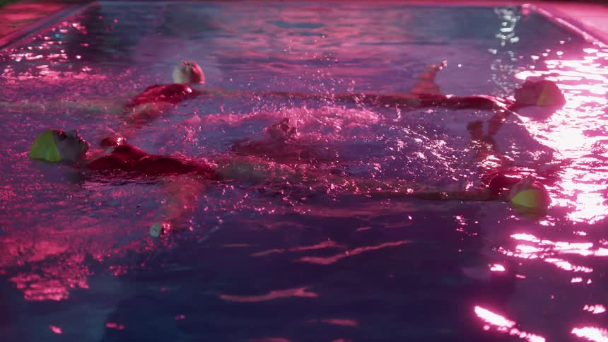 Five synchronized swimmers in a pool