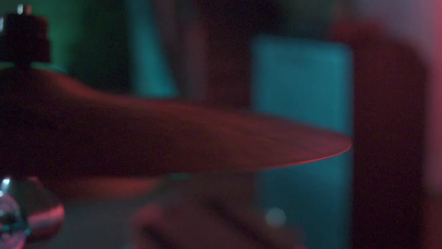 A drum cymbal suddenly moves slightly