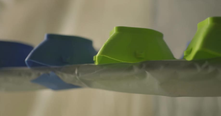 Bowl shaped items sit on the shelf