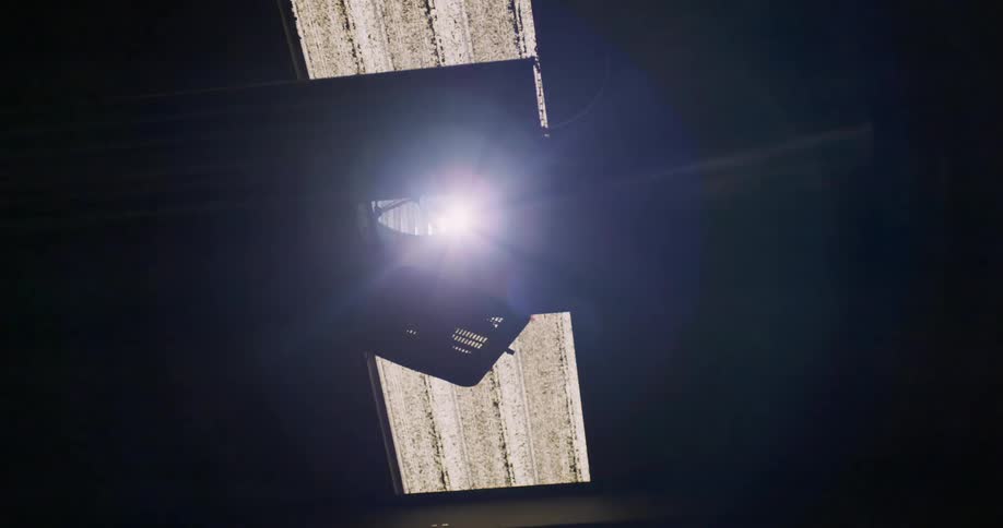 The sun shining through a skylight on a ceiling