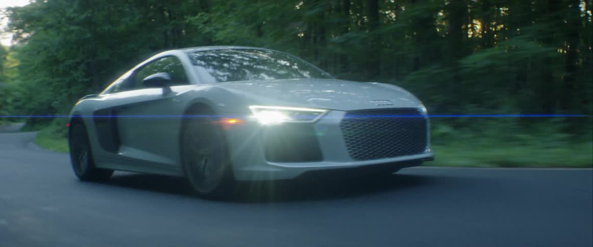 A car speeding along a country road