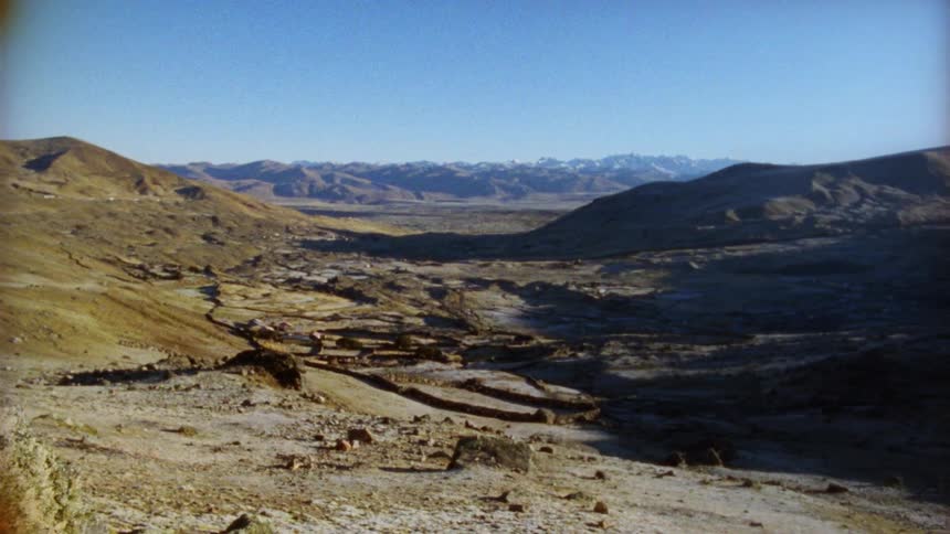 Rocky hills and slopes on a bright blue sky day