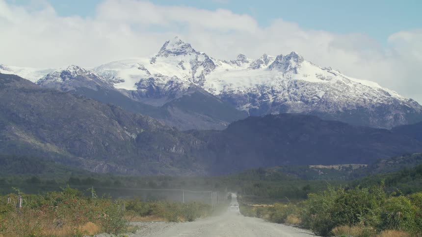 A mountain with snow on top of it is displayed