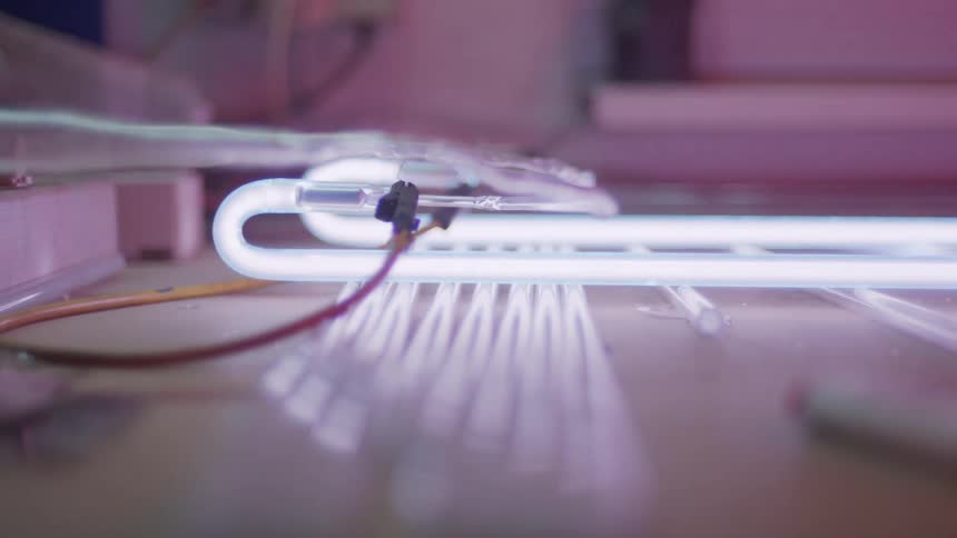A neon light lights up