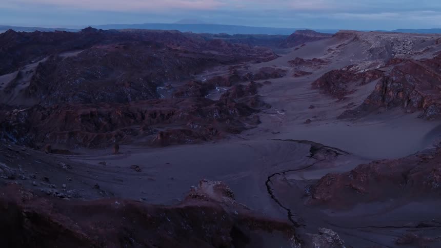 A mountain valley filled with soil between mountains