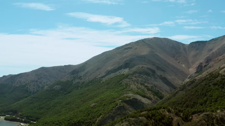 Landscape view of rolling hills with a river at the bottom