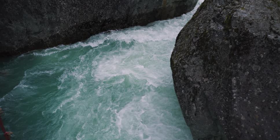 Water flowing on a river between the rocks