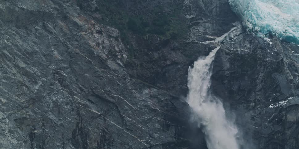 A waterfall crashing down a mountain