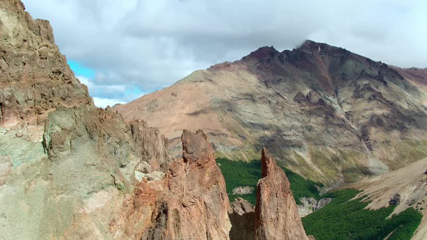 A mountain range is displayed during midday