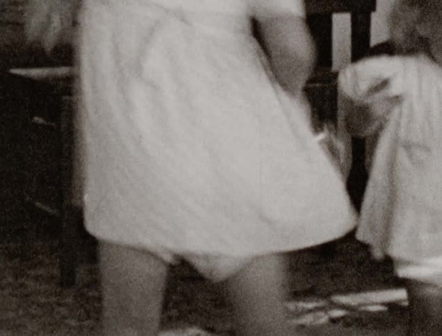 Two little girls dancing