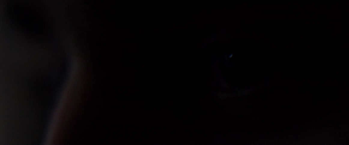 Lights flash on a person's eyes