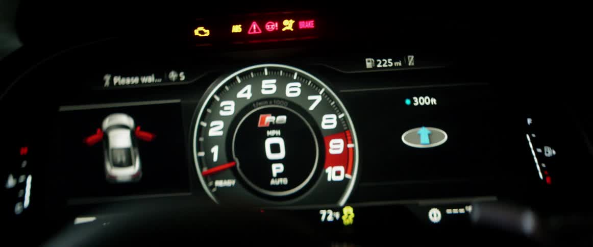 Lights fading in the distance and then a car dashboard comes in focus