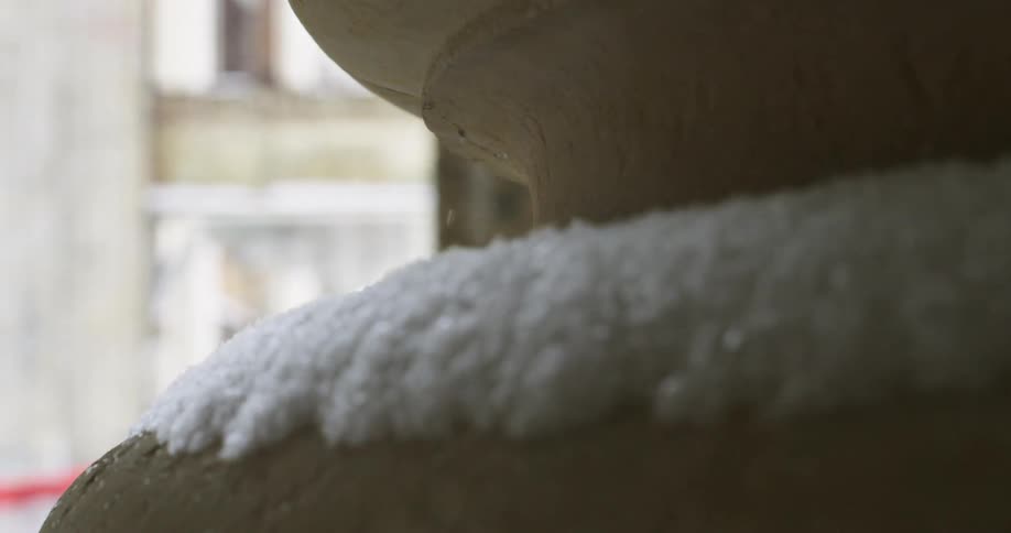 The snow is fall on the stone