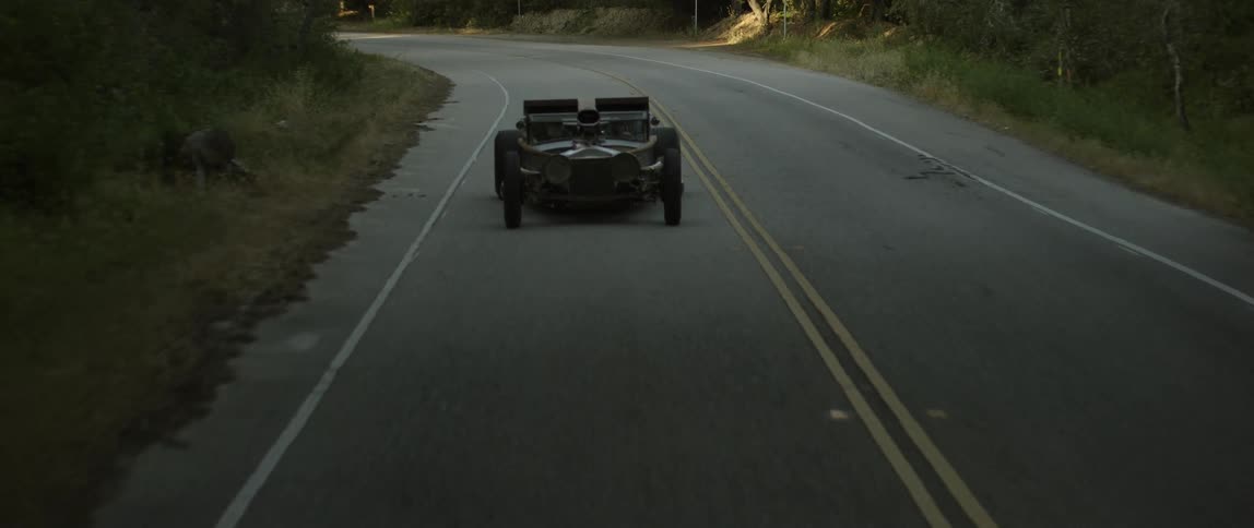 A car driving down a street