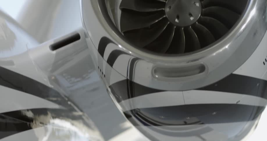 A jet engine sits above an open door