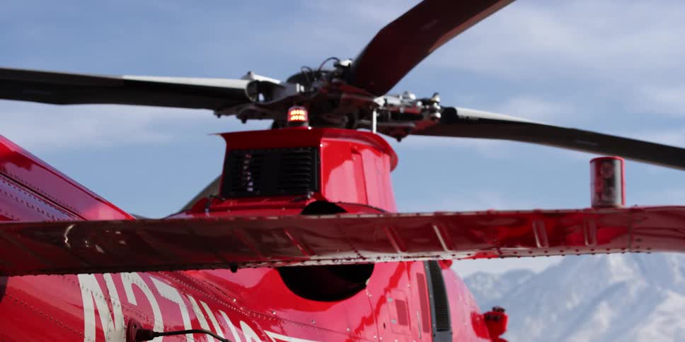 A close view of blinking led lights on a parked helicopter