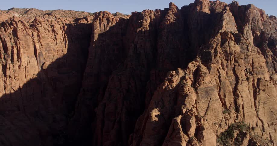 The sheer brown cliffs of a mountain