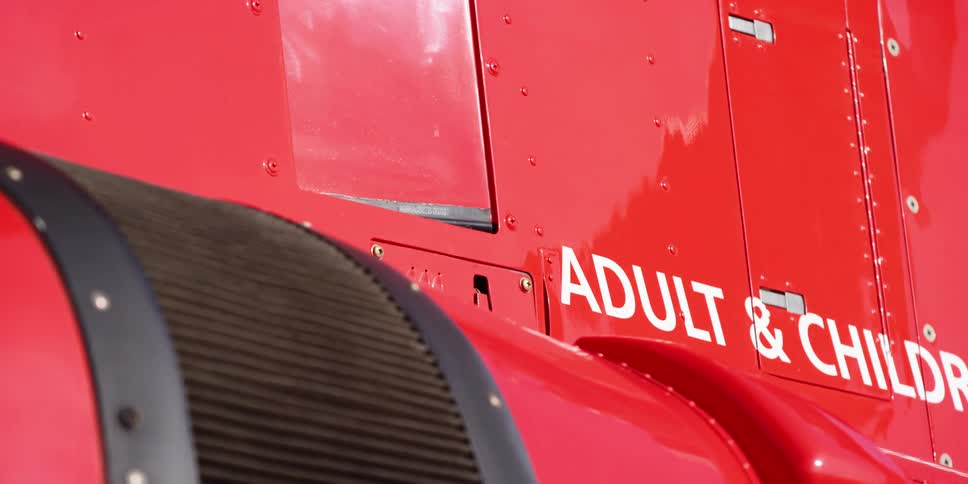 The side of the truck has its business name printed on it