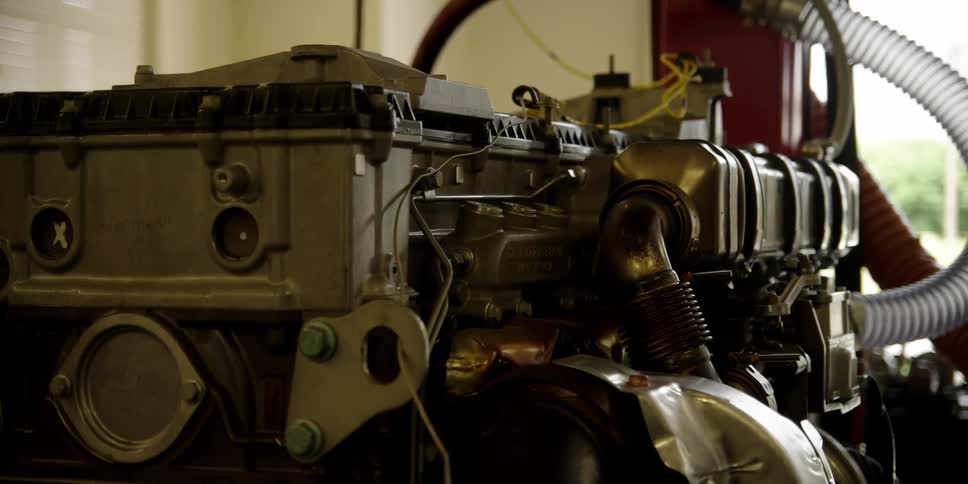 Engine motor with a tube connected sits in a building