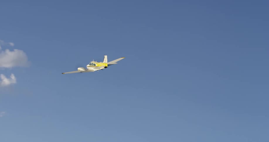 An airplane is flying in the sky