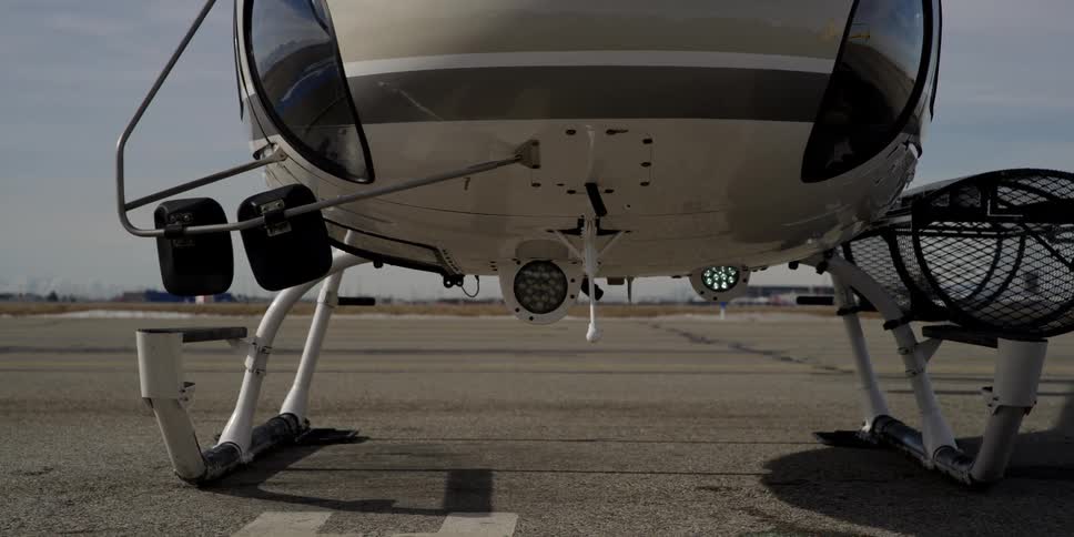 A helicopter is parked on the ground