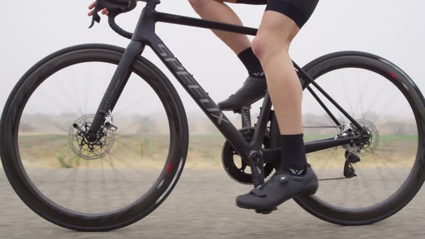 A person is riding a bike outdoors