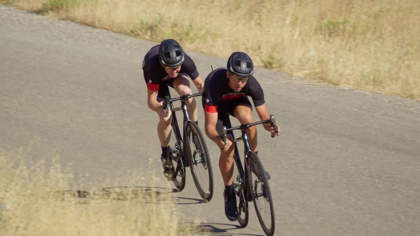 Two men cycling