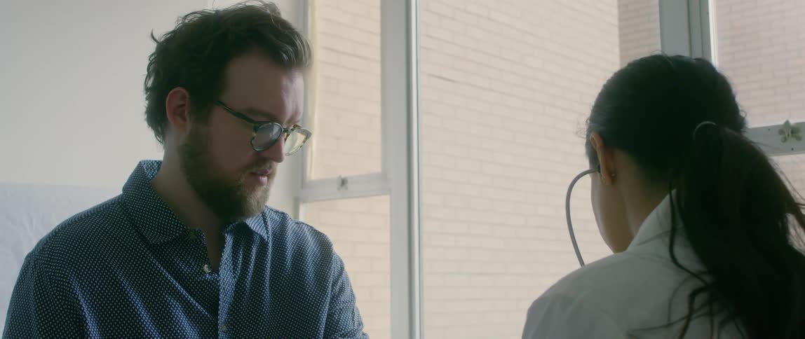 Doctor checks up patient in a clinic