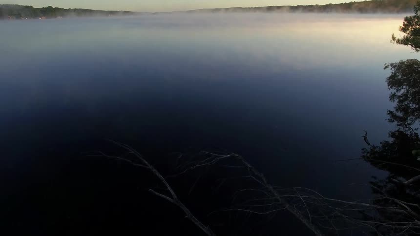 Clouds float over a lake