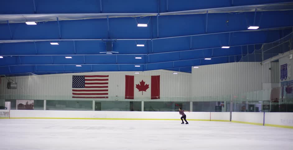 A figure skater practicing on the ice