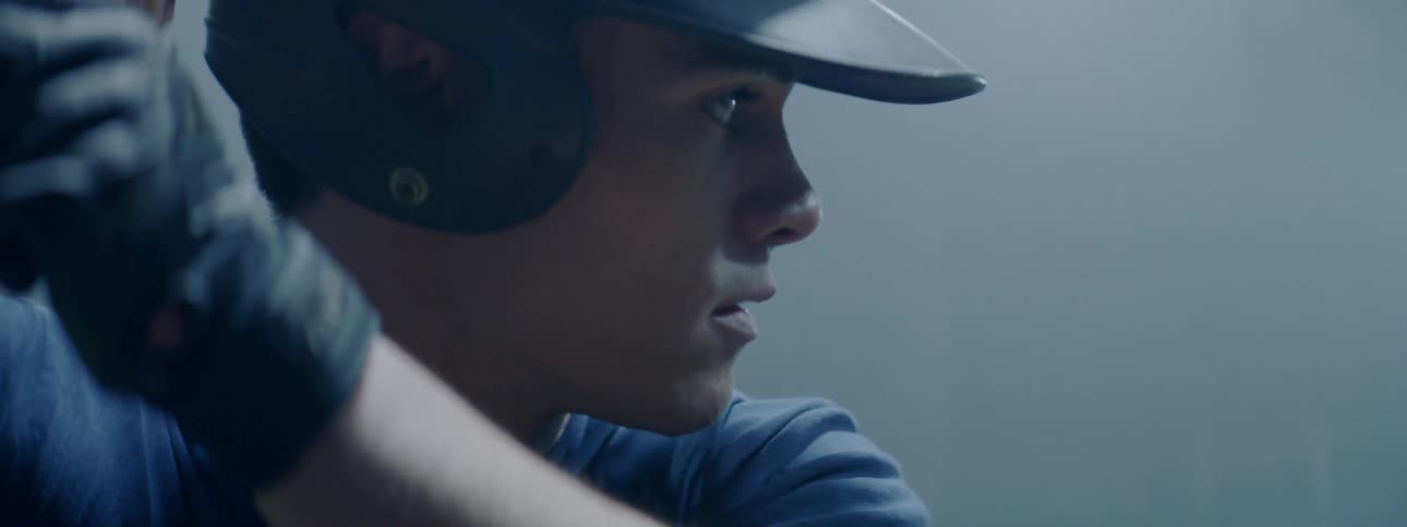 A man is playing baseball