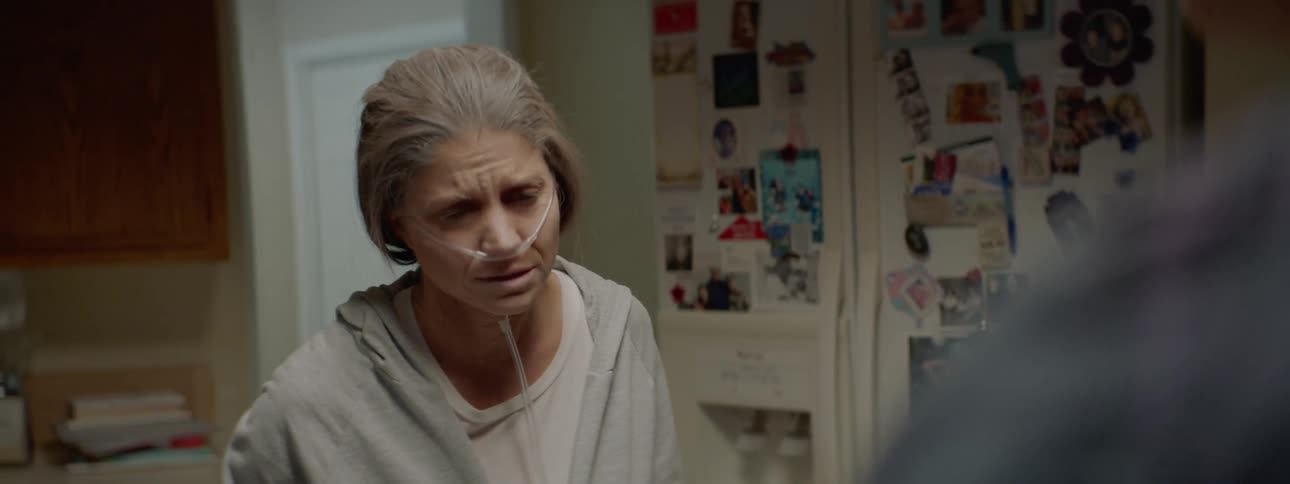 A son yells at his mother on oxygen and she nods her head