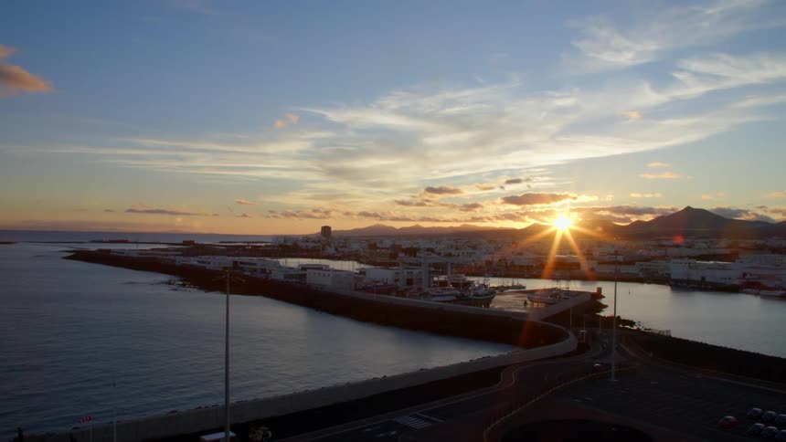 The sun shining down on the water and coastline