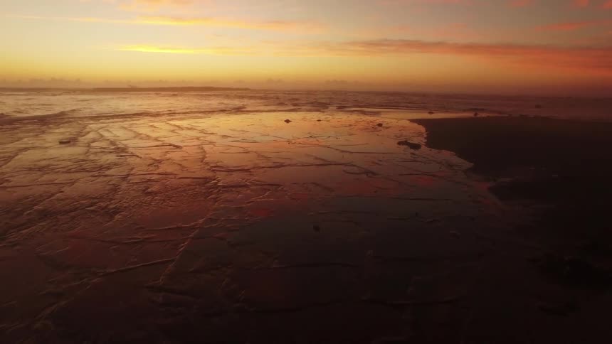 Water splashing up onto shore