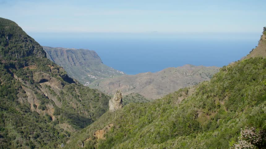 Valley between mountains near the ocean