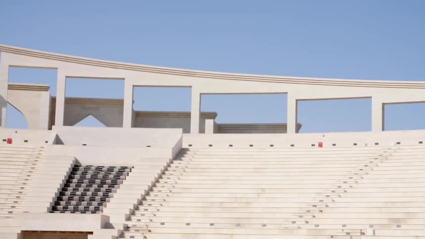 A large outdoor stadium sits empty