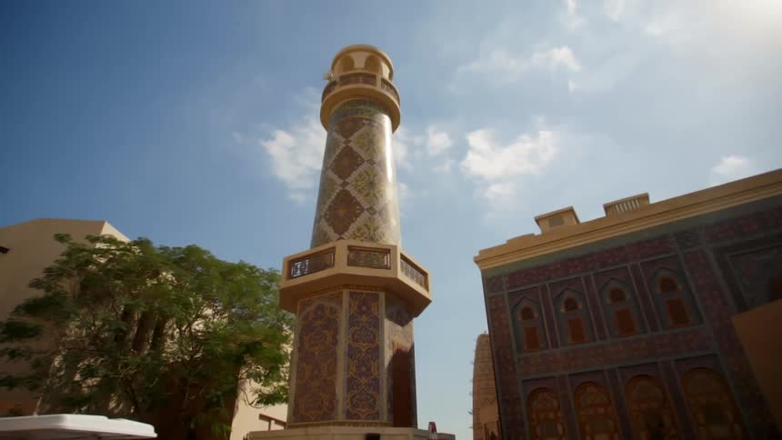 A tower in a city is displayed
