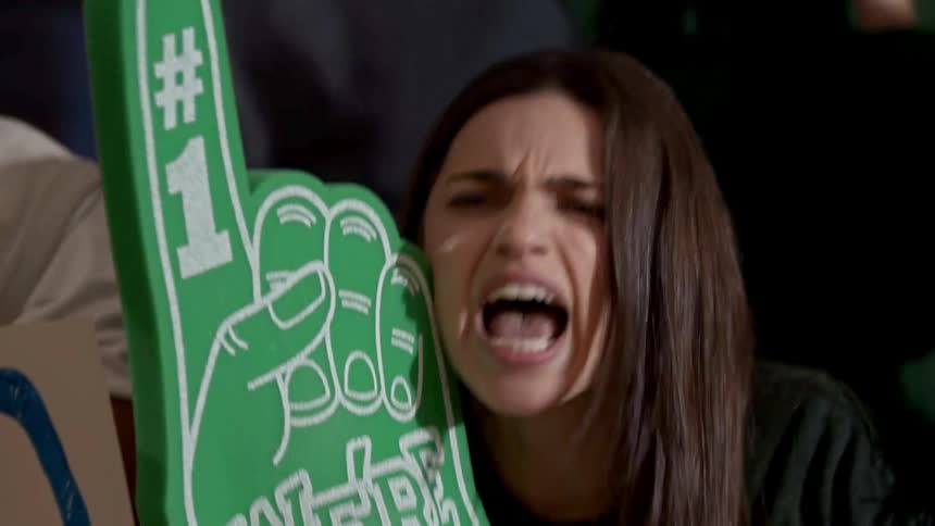 A woman is screaming at a sporting event