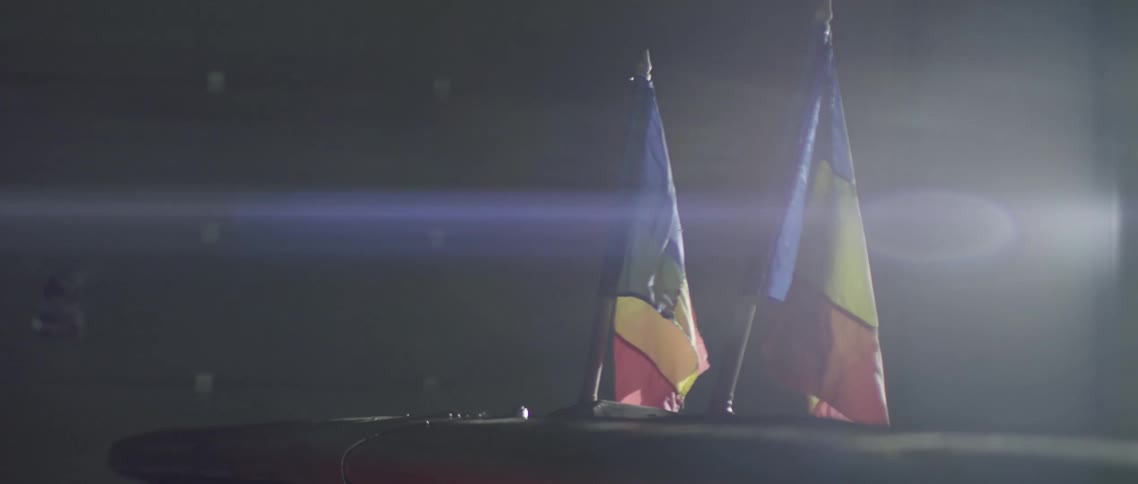 Two colorful flags are side by side