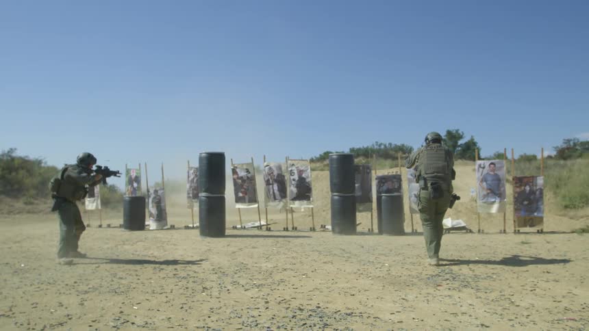 Swat team members train in approaching targets slowly