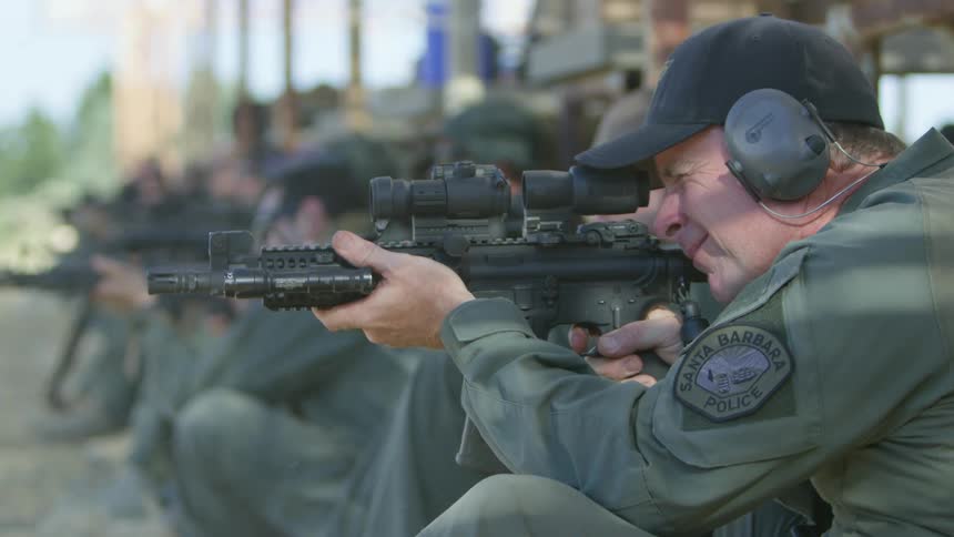 A group of police at a shooting range