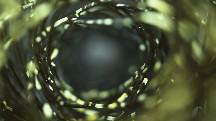 Very close up shot looking down on a wire fence