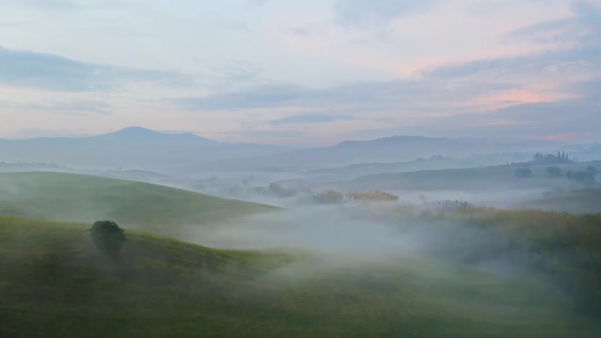 The fog is rolling over the hills