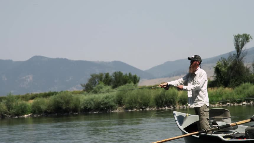 Two men fishing in a boat