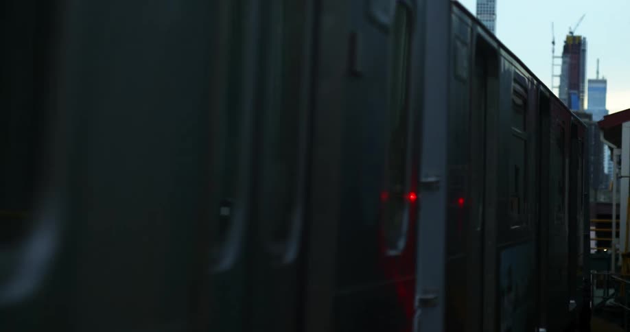 A train driving in a city