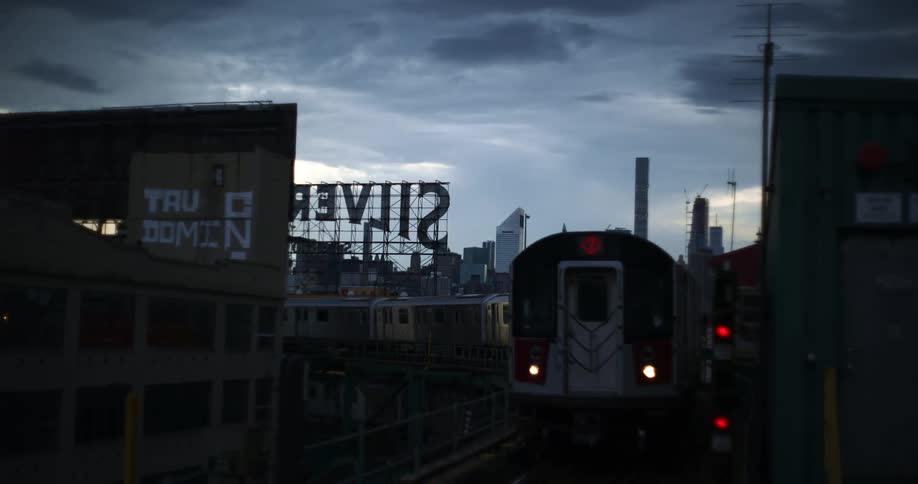 A train driving through a city