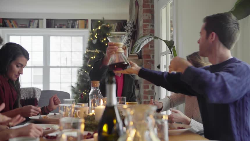 Family enjoys a christmas lunch at home