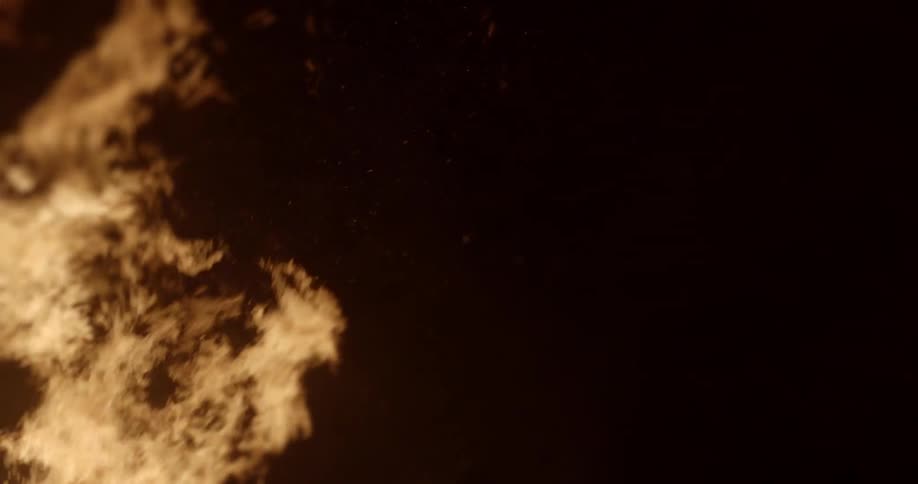 Flames rising from a burning fire
