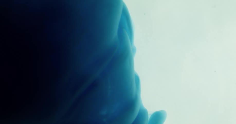 A lump of blue foam grows and expands outward