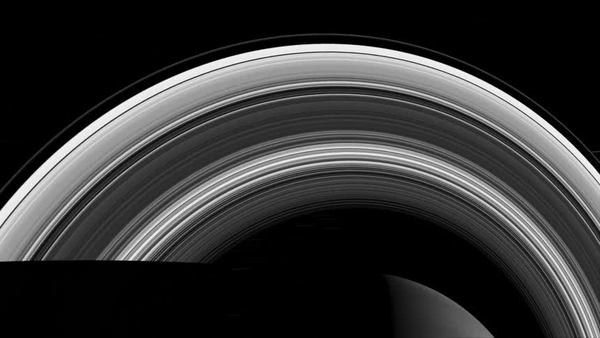The planet saturn casts a shadow of its spinning rings